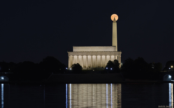 Full Hunter's Moon rising over the Lincoln Memorial and Washington Monument