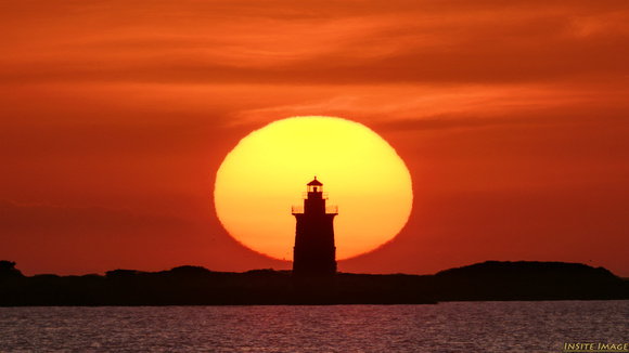 Sunrise with the Delaware Breakwater East End Lighthouse
