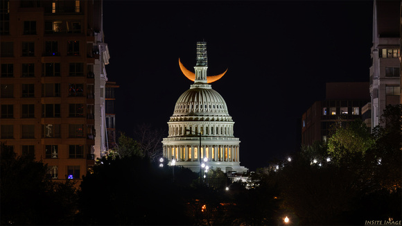 Crescent moon with the U.S. Capitol
