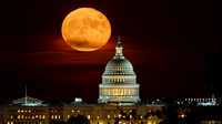 Just-past full Harvest Moon rising above the U.S. Capitol