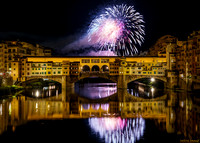 San Giovanni celebration fireworks over Florence Italy’s historic Ponte Vecchio bridge