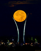 Hunter's Moon / Full moon setting over the US Air Force Memorial