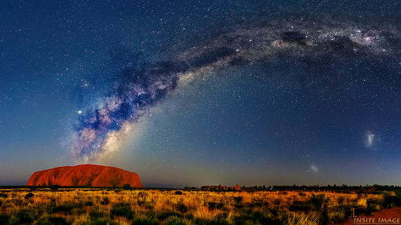 Milky Way over Australia's Uluru (with the Magellanic Clouds - dwarf galaxies)